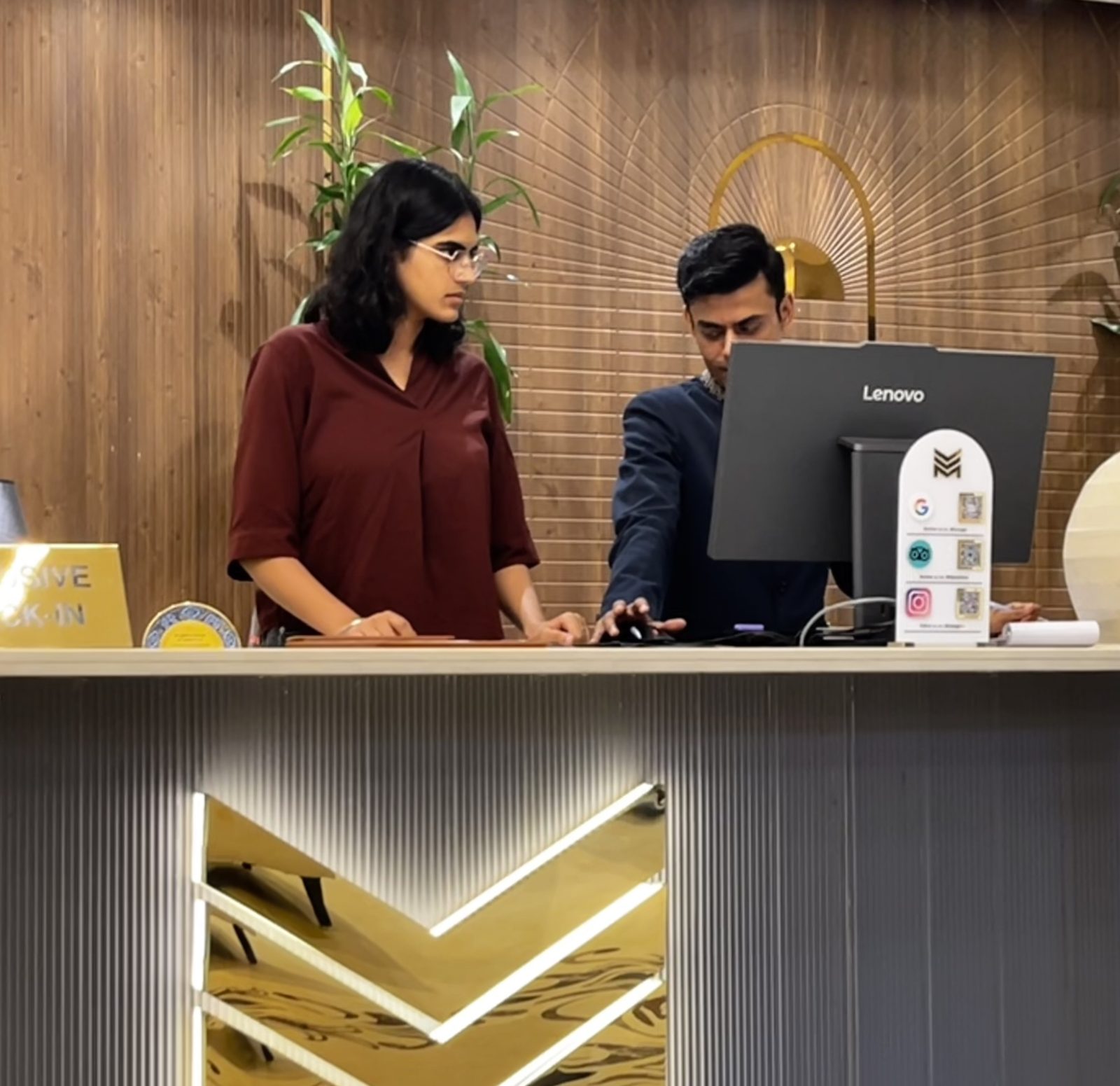 At a hotel front desk